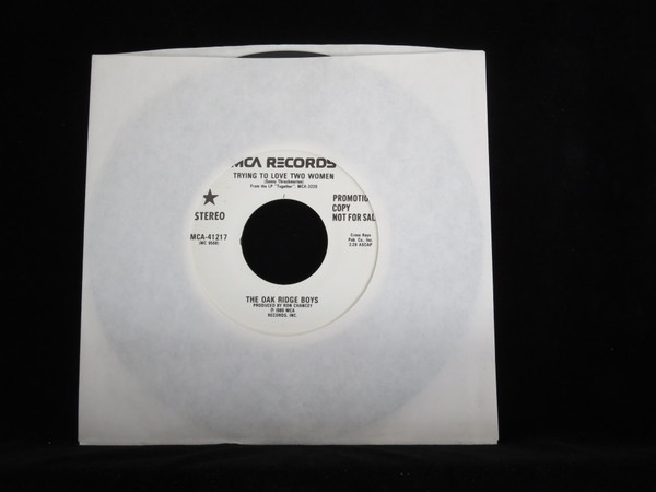 The Oak Ridge Boys - Trying To Love Two Women (7IN-Used)